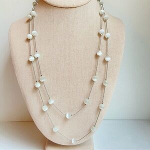 Long white cat’s eye fiber optic glass bead station necklace on silvertone chain